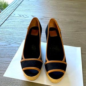 Tory Burch black with tan trim wedge.  Size 6.